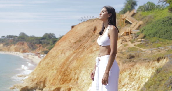 Dreaming Model in White on Landscape alt