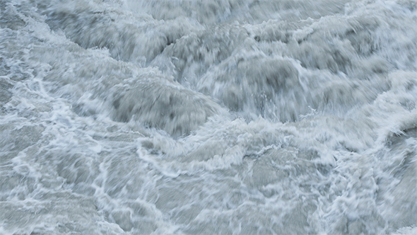 Raging Waters of Hraunfossar Waterfall