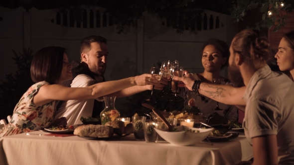 Friends Dining in Garden alt