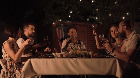 Friends Clinking Glasses of Wine alt