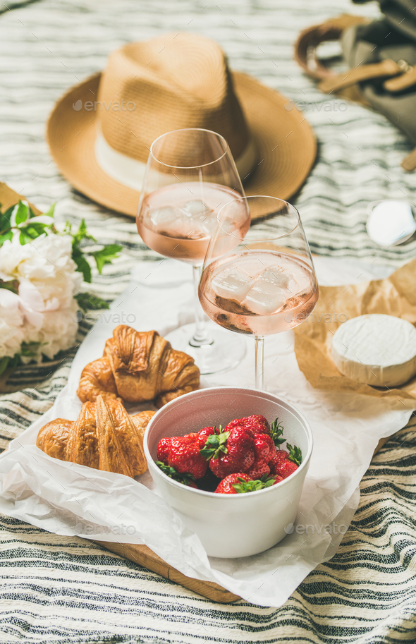 French style summer picnic setting, outdoor gathering concept, vertical composition - Stock Photo - Images