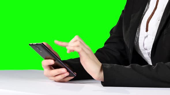 Businesswoman Touching Smartphone. Green Screen alt