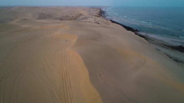 Flying Above Sand Sea Beach