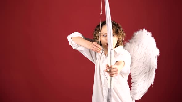 Woman As Cupid Angel Aiming with Wings, Bow and Arrow. Valentine's Day. Valentine Female. alt