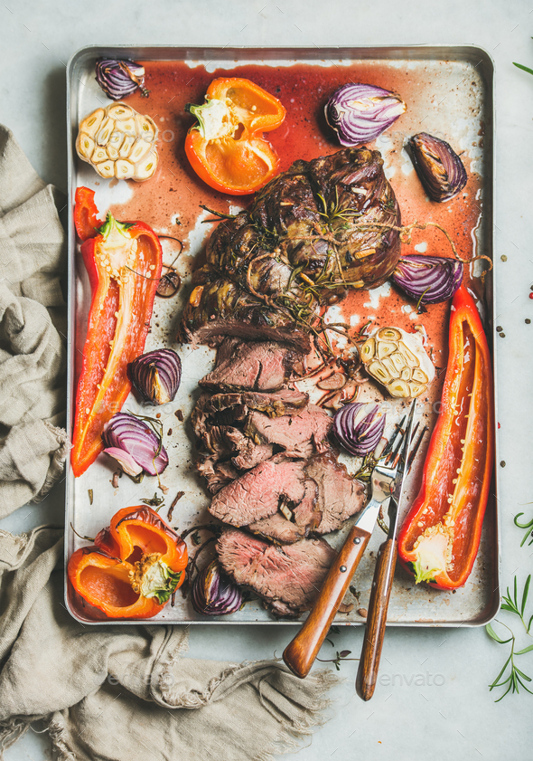 Cooked Roastbeef meat with grilled vegetables and herbs - Stock Photo - Images