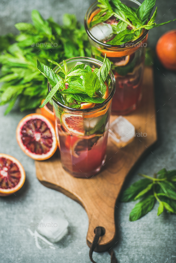Blood orange citrus lemonade with fresh mint and ice cubes - Stock Photo - Images