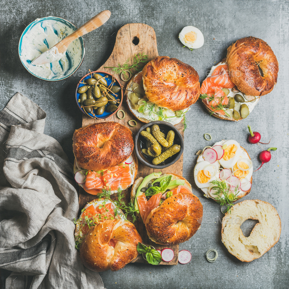 Variety of bagels with vegetables, salmon and cream cheese - Stock Photo - Images