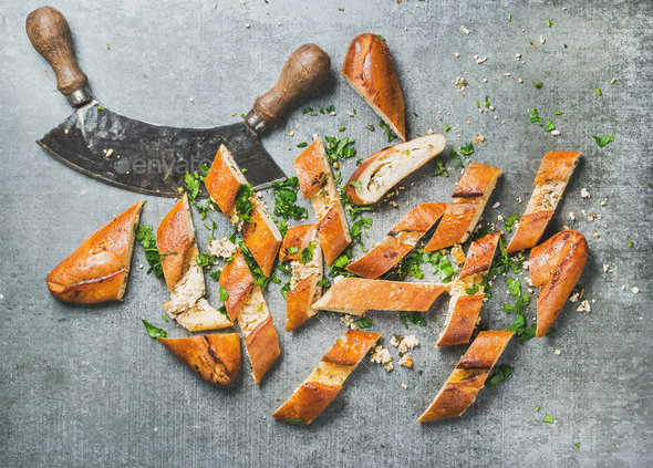 Slices of turkish pizza pide and herb chopper - Stock Photo - Images
