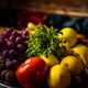 Mix of delicious fruits in a plate on a wooden table - PhotoDune Item for Sale