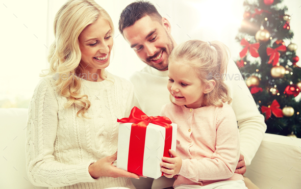 happy family at home with christmas gift box