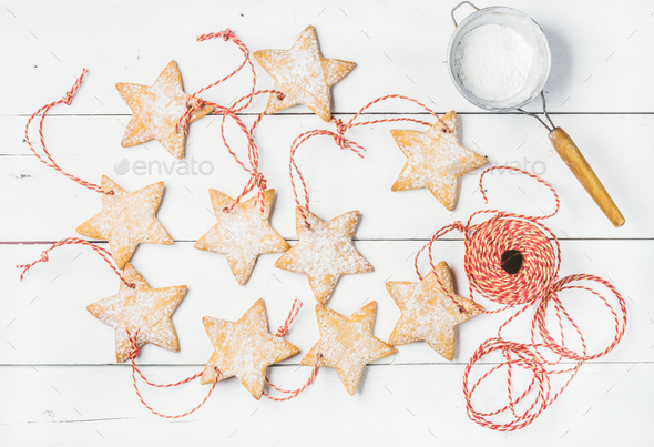 Christmas gingerbread homemade star shaped cookies with sugar powder - Stock Photo - Images