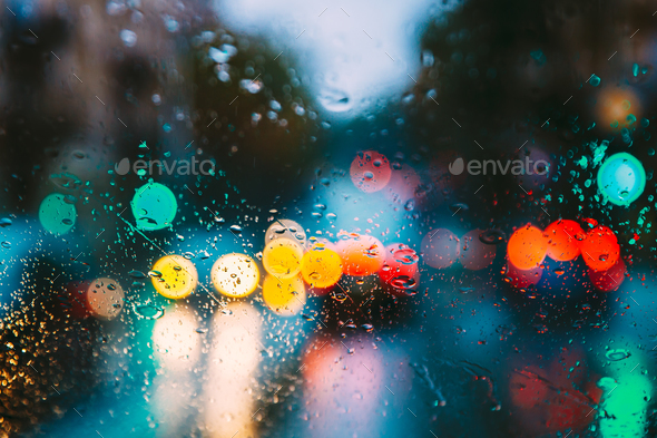 Drops Of Rain Water In Night Or Evening Street Lights On Blue Gl - Stock Photo - Images