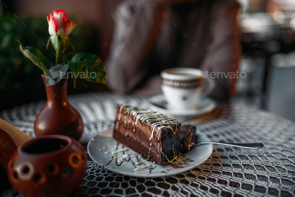 Delicious chocolate cake and a cup of coffee - Stock Photo - Images