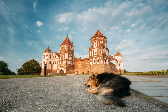 Mir, Belarus. Mir Castle Complex On Blue Sunny Sunset Sky Backgr - Stock Photo - Images