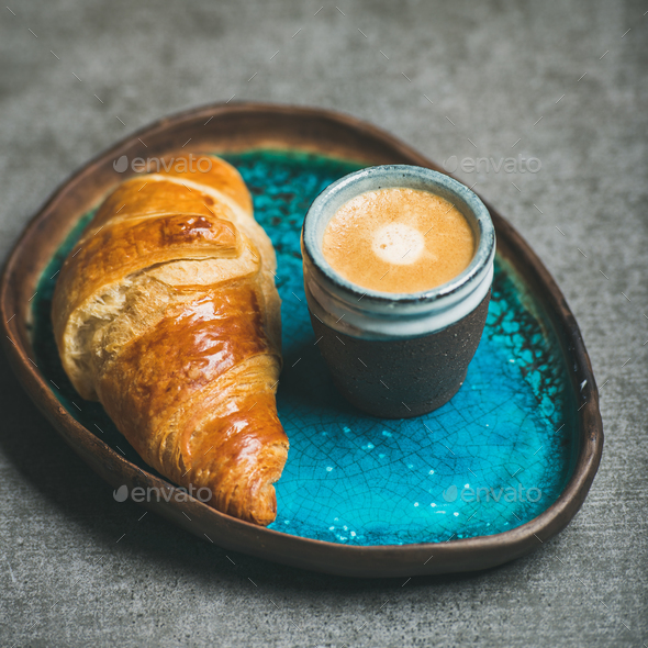 Cup of espresso coffee and croissant, square crop - Stock Photo - Images