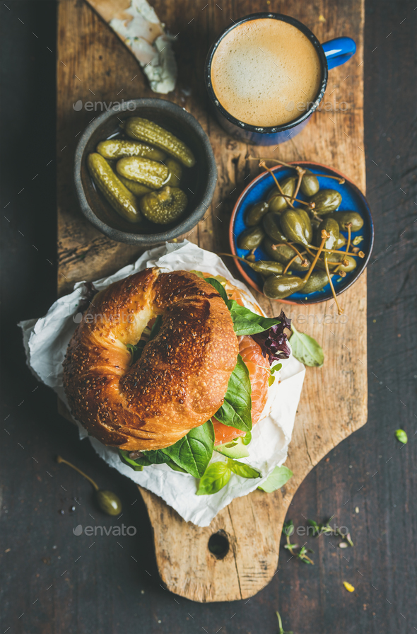 Breakfast with bagel, espresso coffee, capers and pickles - Stock Photo - Images