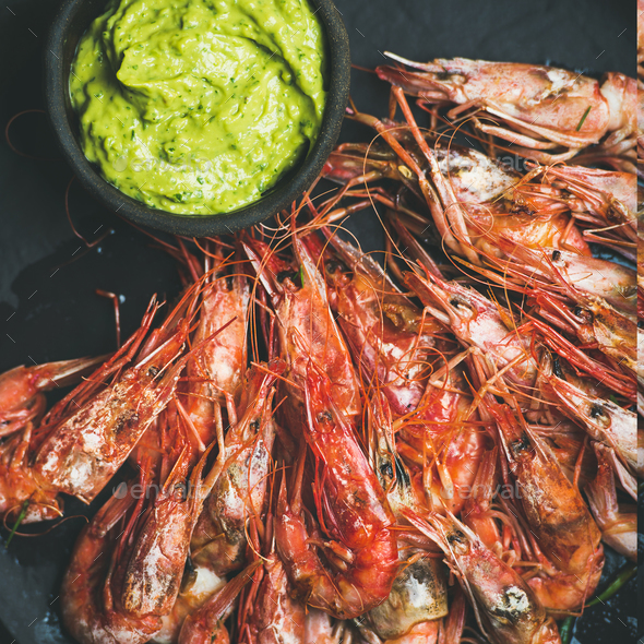 Roasted red shrimps with guacamole avocado sauce, square crop - Stock Photo - Images