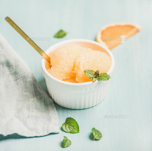 Pink grapefruit homemade sorbet with fresh mint leaves - Stock Photo - Images