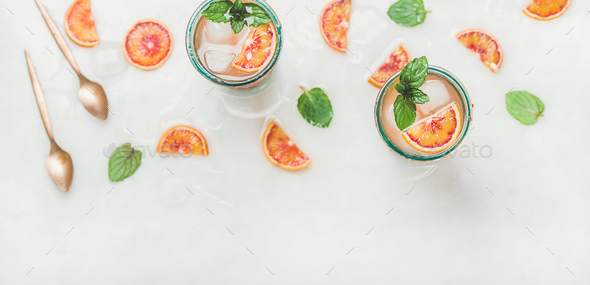 Homemade blood orange lemonade with mint and ice cubes - Stock Photo - Images