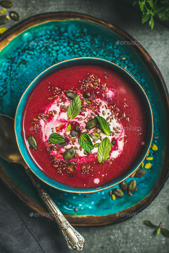 Beetroot soup with mint, chia, flax, pumpkin seeds, top view - Stock Photo - Images