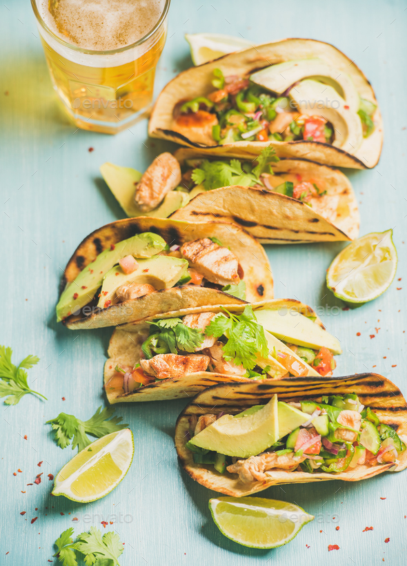 Healthy corn chicken and avocado tortillas, beer in glass - Stock Photo - Images