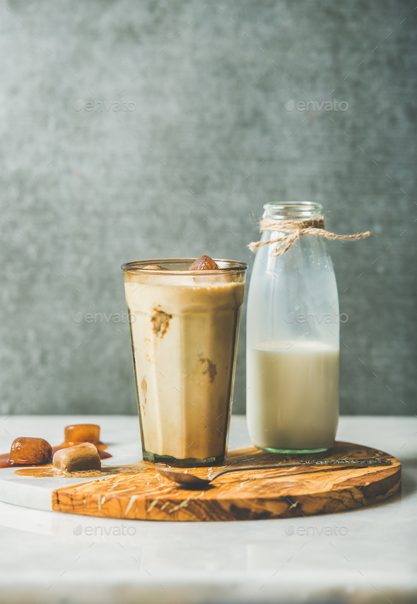Iced caramel latte coffee cocktail and milk in bottle - Stock Photo - Images