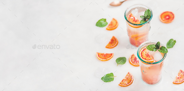 Homemade blood orange lemonade with mint and ice - Stock Photo - Images
