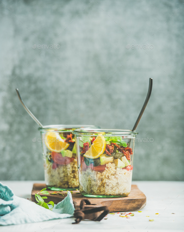 Healthy vegetarian salad with quionoa, avocado, dried tomatoes - Stock Photo - Images