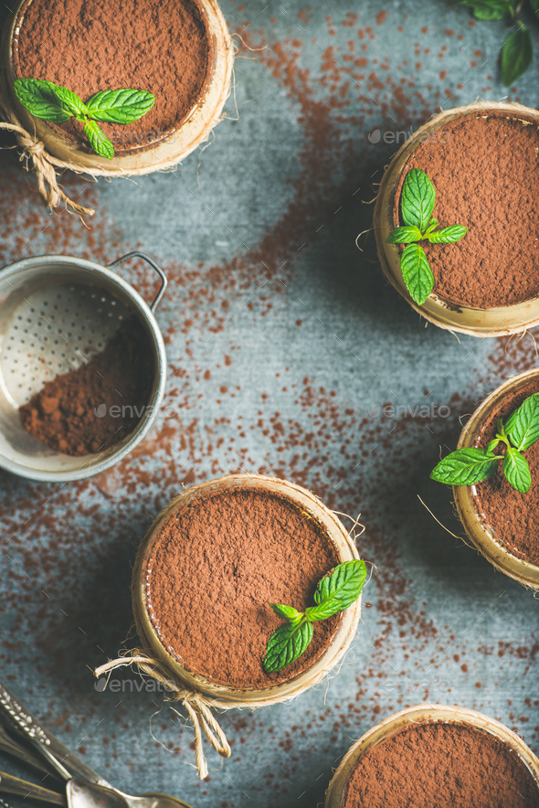 Homemade Italian dessert Tiramisu in glasses with mint, copy space - Stock Photo - Images