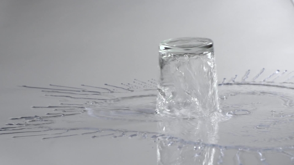 Drinking Glass with Water Hits the Ground