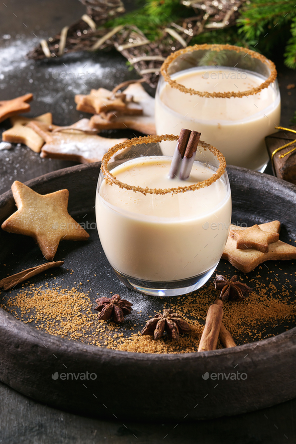 Two Glasses Of Christmas Eggnog. - Stock Photos