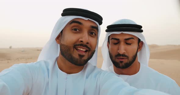 Young men spending a day in the dubai desert alt