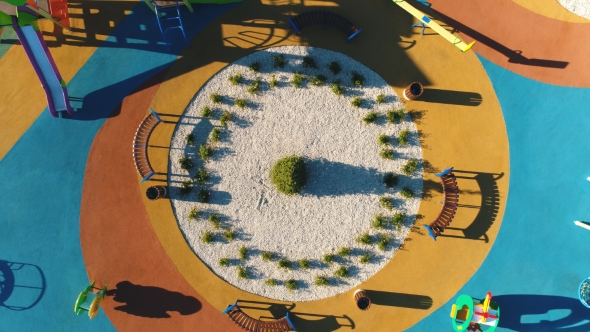 Aerial View on Colorful Children's Playground in a Yard alt