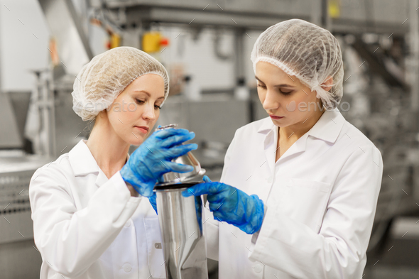 women technologists working at ice cream factory