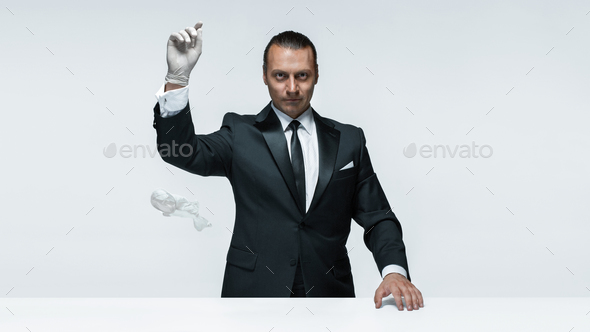 At Your service, well dressed man waiting for orders isolated on white background with copy space