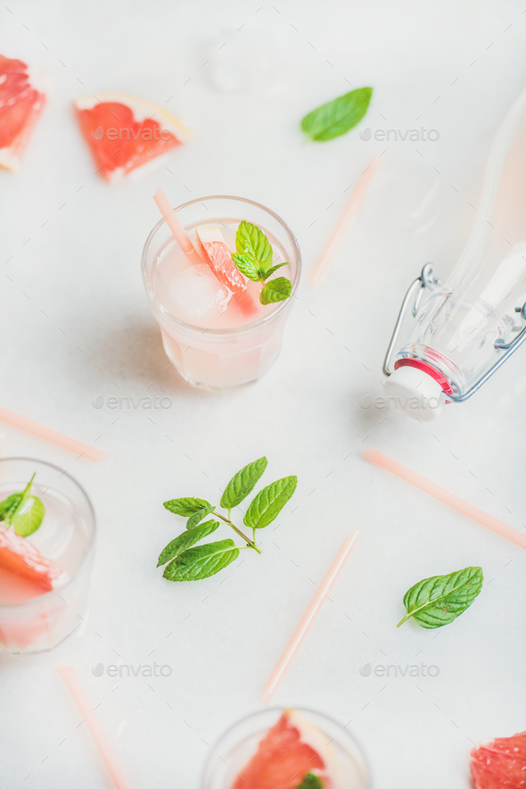 Cold refreshing summer alcohol cocktail with fresh grapefruit - Stock Photo - Images