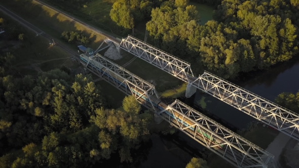 Passenger Train Goes Over the Bridge, Filming From the Top alt