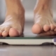 Man Measuring Weight on Health Scale - VideoHive Item for Sale