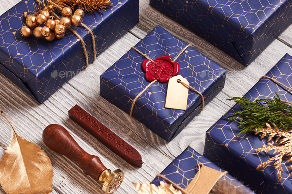 Christmas presents on wooden background - Stock Photo - Images