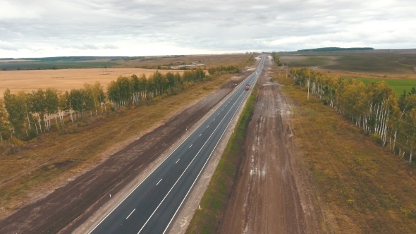 Aerial View on Tracks Between Agriculture Fields alt