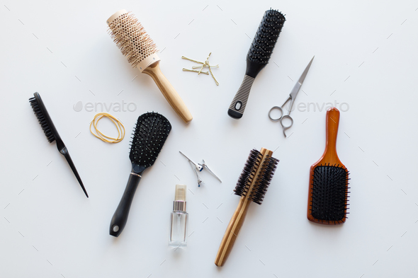 scissors, hair brushes, clips and styling spray - Stock Photo - Images