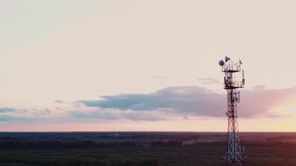 Silhouette Telecommunications Antenna for Mobile Phone at Sunset