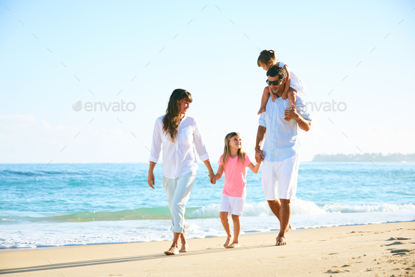 Happy Family on the Beach - Stock Photo - Images