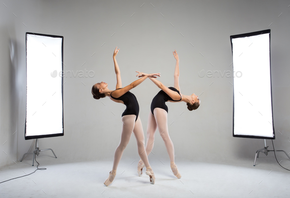 Backstage shooting two graceful dancers in the studio - Stock Photo - Images