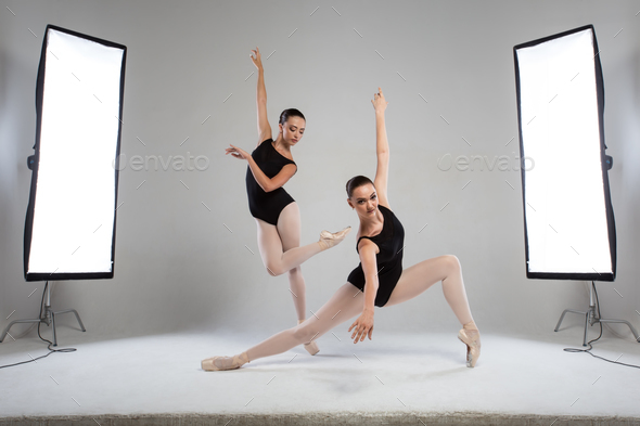 Backstage shooting two beautiful ballerinas in the studio - Stock Photo - Images