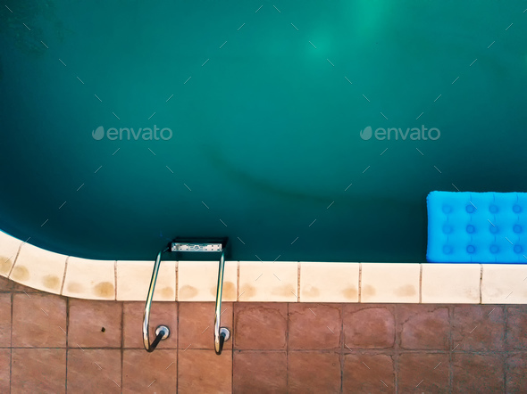 Aerial view of inflatable mattress in swimming pool - Stock Photo - Images