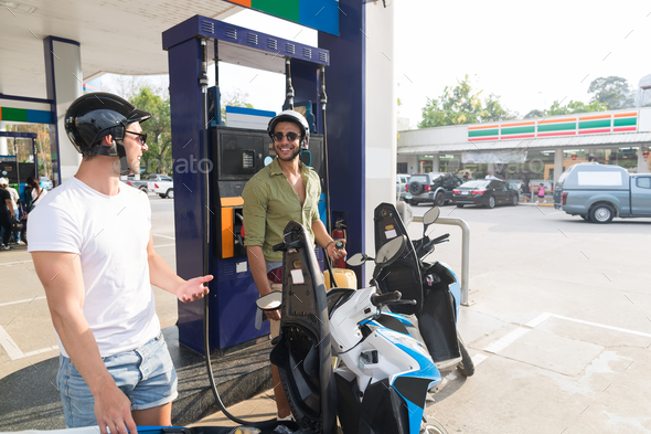 Man Couple On Gas Station Fuel Motor Bike, Happy Smiling Guys Travelling