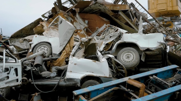A Broken and Broken Old Machine Lies in the Trash, This Vehicle Will Be Sent for Recycling alt