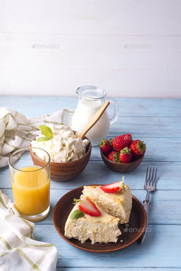 healthy breakfast cottage cheese casserole with juice - Stock Photo - Images