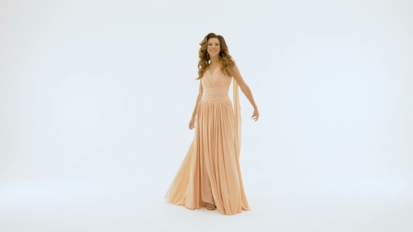 Beautiful Girl with Long Hair, She Sings on a White Background.